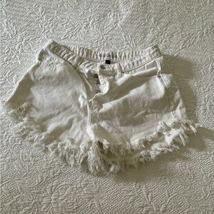 White Wild Fable shorts. In cut off fashion.